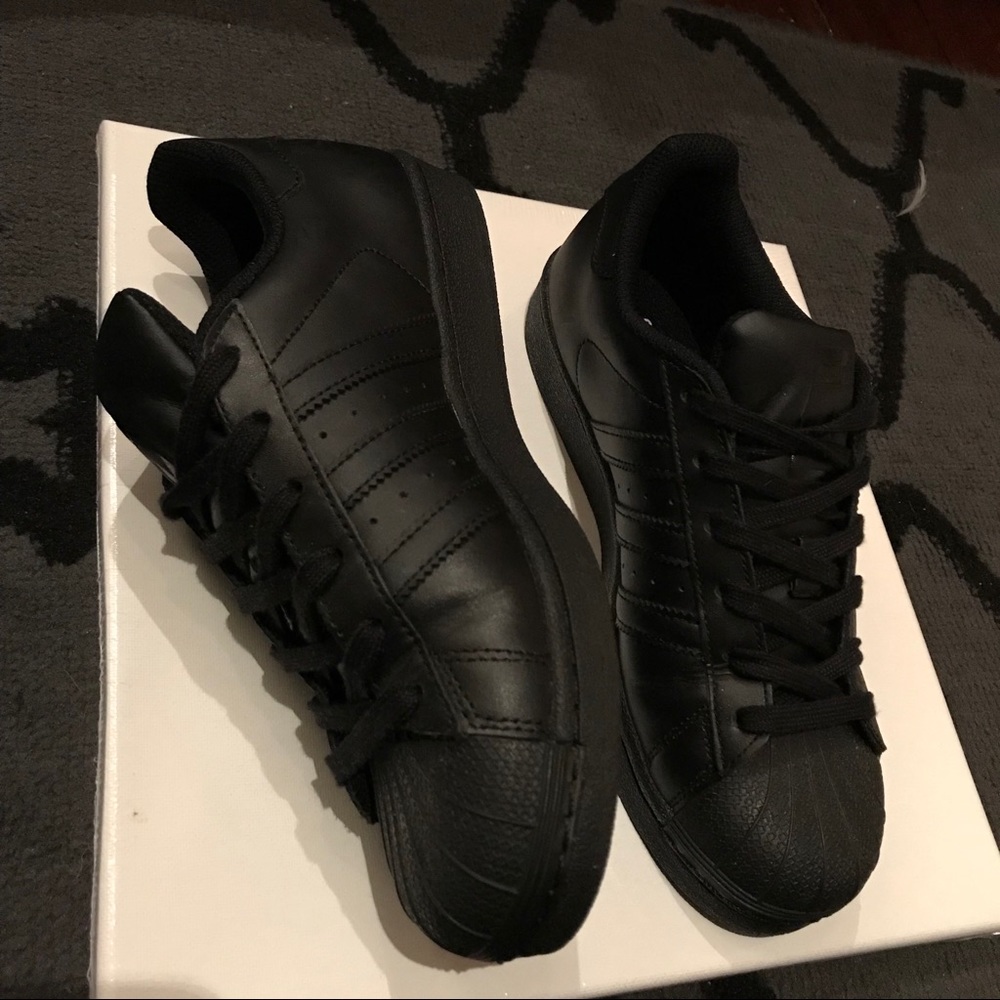Black Adidas Superstars